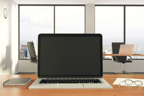 Blank black laptop screen with diary and eyeglasses on wooden ta - Φωτογραφία, εικόνα