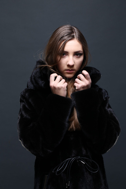 Portrait of a seductive lady in fur coat - Photo, Image