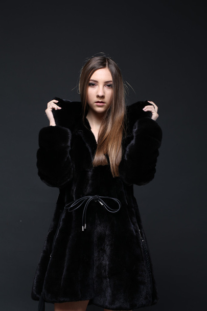 Portrait of a seductive lady in fur coat - Фото, зображення