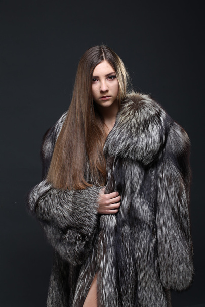 Portrait of a seductive lady in fur coat - Photo, image