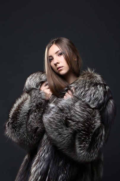 Portrait of a seductive lady in fur coat - Fotografie, Obrázek
