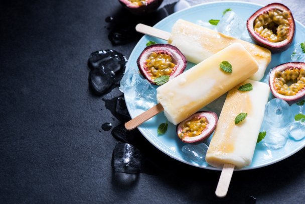 healthy and refreshing, homemade passion fruit and yogurt popsicle - Photo, Image