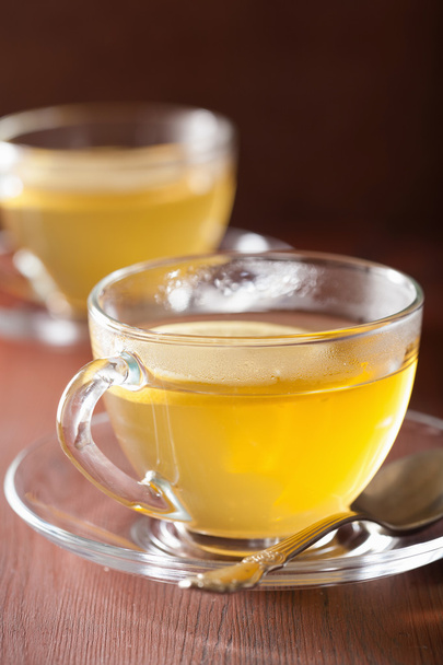 hot lemon ginger tea in glass cup - Фото, зображення