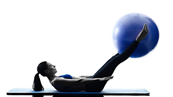 Woman pilates exercising with fitness ball - Zdjęcie, obraz