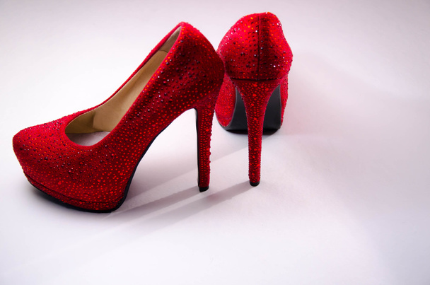 close up of a red high heels on white background - Photo, Image