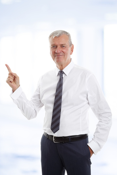 businessman showing something with his finger. - Photo, image