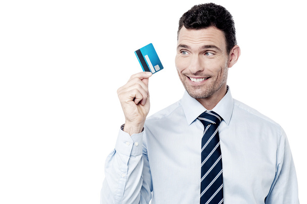 businessman looking at his cash card - Zdjęcie, obraz