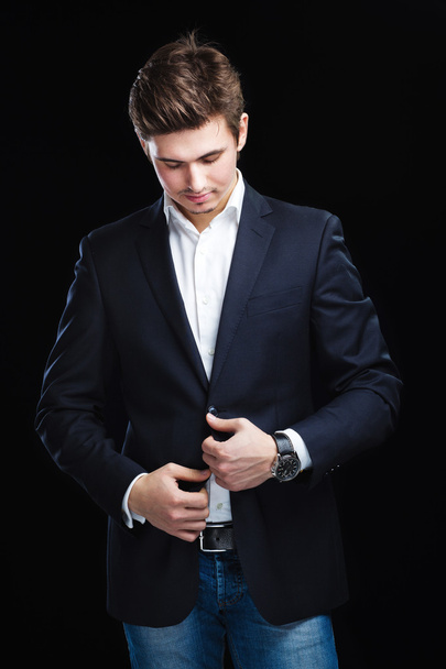 Fashion young businessman black suit - Фото, изображение