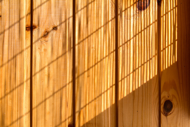 Wooden wall background in a morning light - Photo, Image