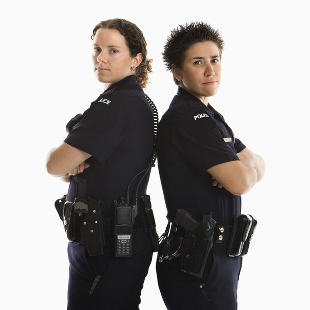 Policewomen back to back. - Foto, imagen