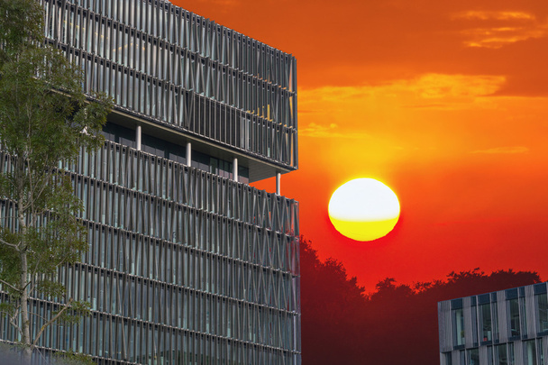 ffice gebouwen en zonsondergang - Foto, afbeelding