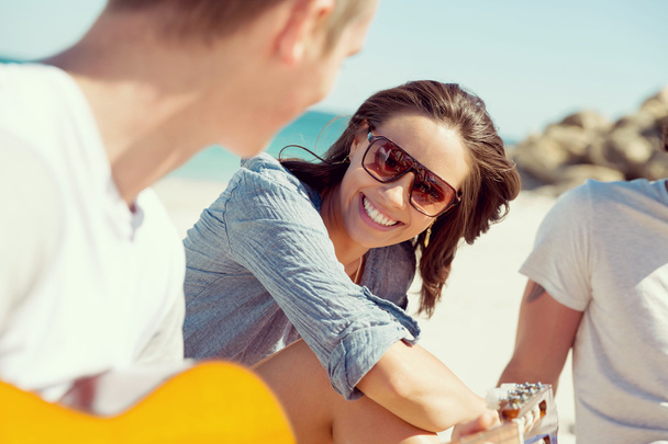 Beautiful young people with guitar on beach - Fotoğraf, Görsel
