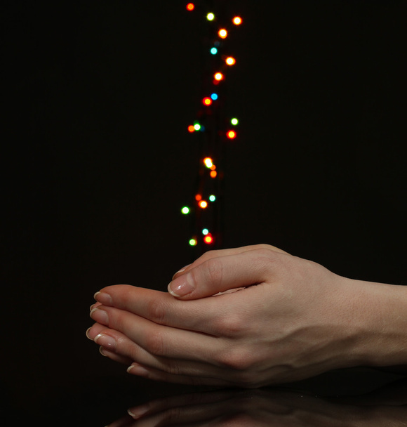 Hands with bright bokeh backdground - 写真・画像