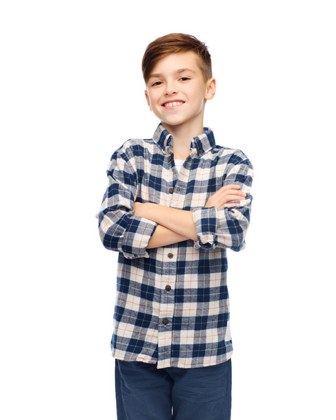 usměvavý chlapec v kostkované košili a džínách - Fotografie, Obrázek