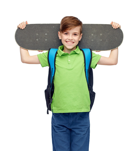 happy student boy with backpack and skateboard - Foto, Imagen