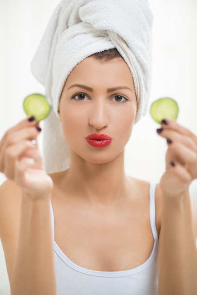 Face Treatment with cucumber - 写真・画像