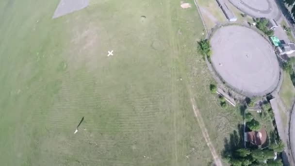 Shadow of landing skydiver from the head point of view - Footage, Video
