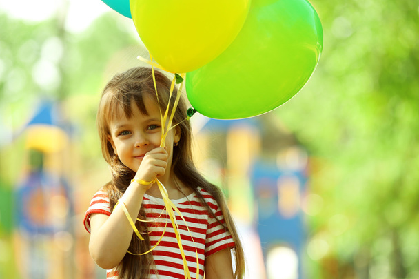 Little girl with balloons  - Zdjęcie, obraz