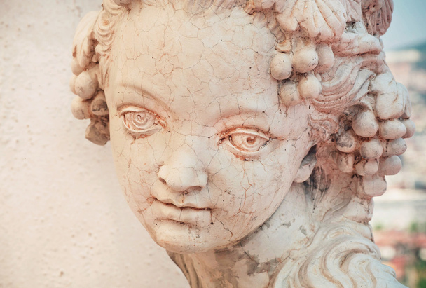 Girl portrait in stone. Copy of rustic antique sculpture  - Zdjęcie, obraz