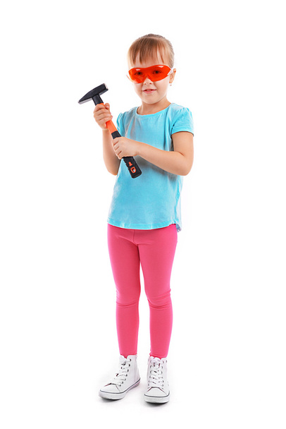 Little girl with tools on white - Foto, afbeelding