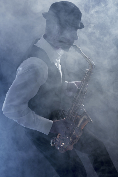 man playing on saxophone - Fotó, kép