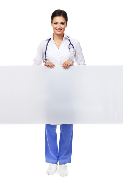 Smiling medical doctor holding a screen - Photo, image