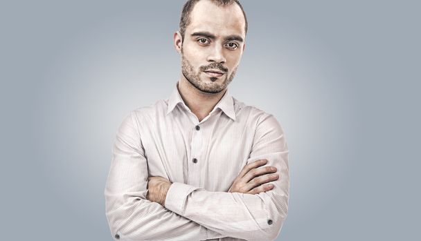 Fashion young businessman on gray background - Fotografie, Obrázek