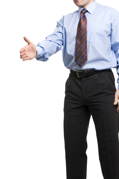 Бізнесмен у блакитній сорочці тримає вітальний жест, пропонуючи
 - Фото, зображення