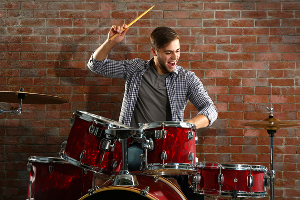 Musician playing drums - Фото, изображение
