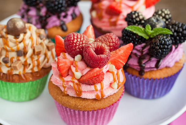 Conjunto de diferentes deliciosos cupcakes
 - Foto, Imagem