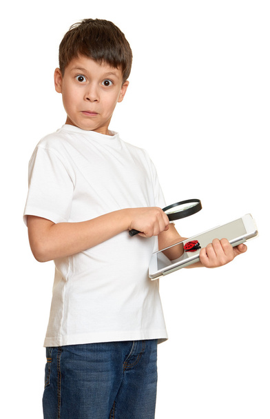 boy with computer tablet found a bug, information security concept - Photo, Image