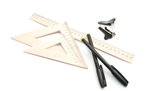 staple remover, black pens and ruler - Fotó, kép