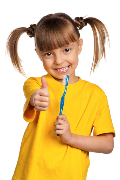 Fille avec brosse à dents
 - Photo, image