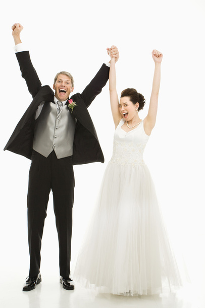 Cheering bride and groom. - 写真・画像