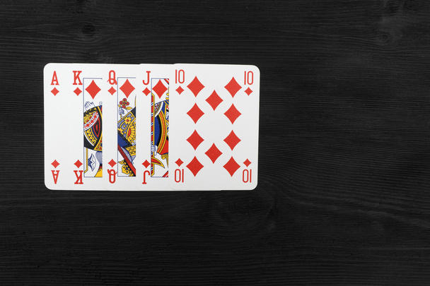 Playing cards isolated on black background - Photo, Image
