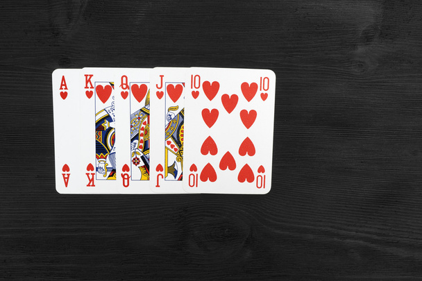 Playing cards isolated on black background - Photo, Image