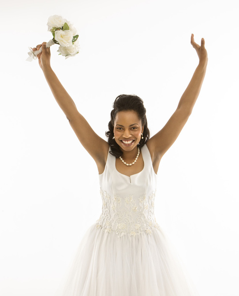 Bride holding bouquet. - Фото, изображение