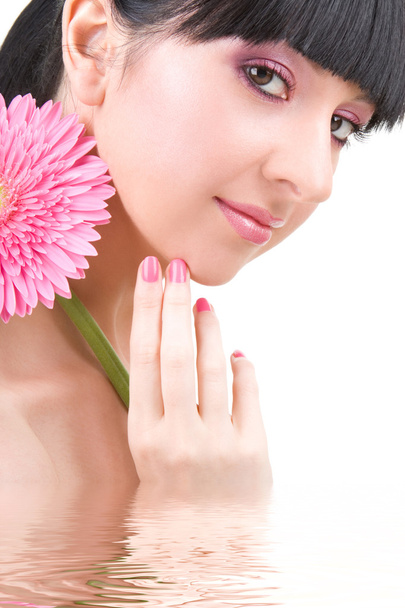 Young woman with gerber flower - Foto, Imagen