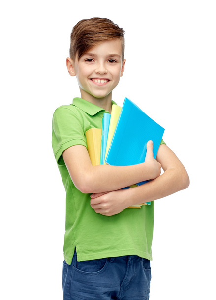 happy student boy with folders and notebooks - Fotoğraf, Görsel