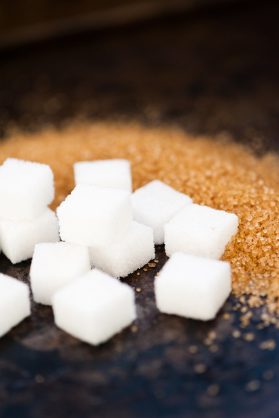 Close up of sugar on a black background - Photo, Image