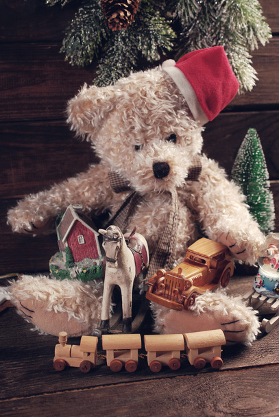 vintage christmas  toys for boys on wooden background  - Foto, afbeelding