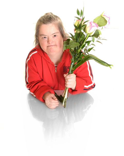 Синдром Дауна жінка з квітами
 - Фото, зображення