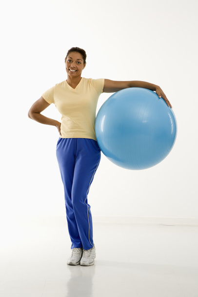 Woman with exercise ball. - Фото, изображение