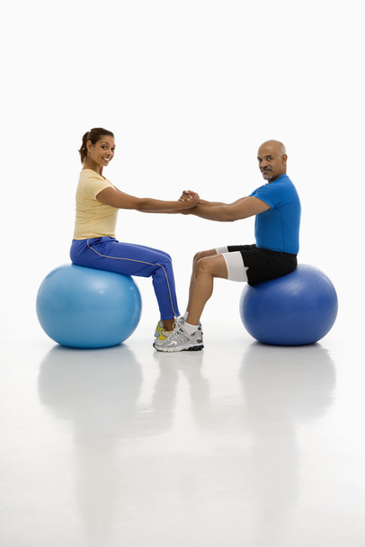 Man and woman exercising. - Foto, Imagen