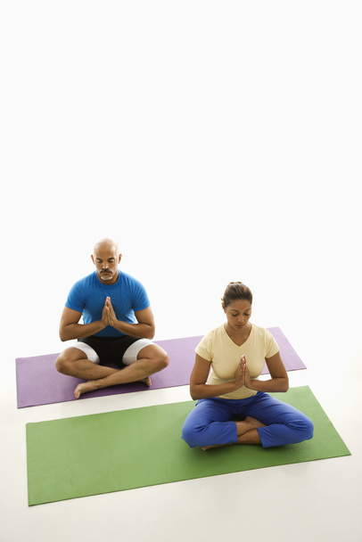 Two practicing yoga. - Фото, изображение