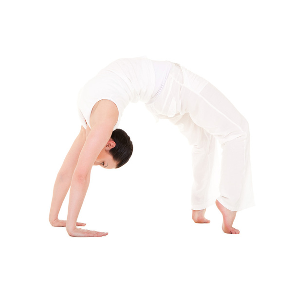 Young woman doing yoga exercise - Photo, Image