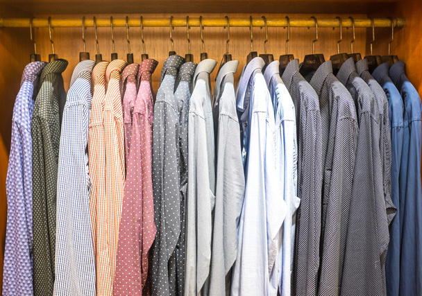 Men wardrobe with long sleeve shirts - Photo, Image