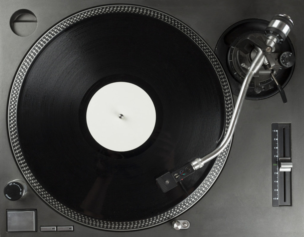 Turntable playing vinyl close up with needle on the record  - 写真・画像