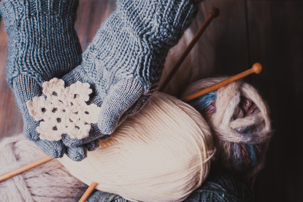 Hands in knitted gloves - Foto, imagen