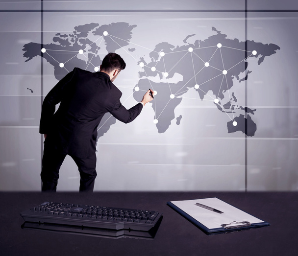 Persona de negocios dibujando puntos en el mapa del mundo
 - Foto, Imagen